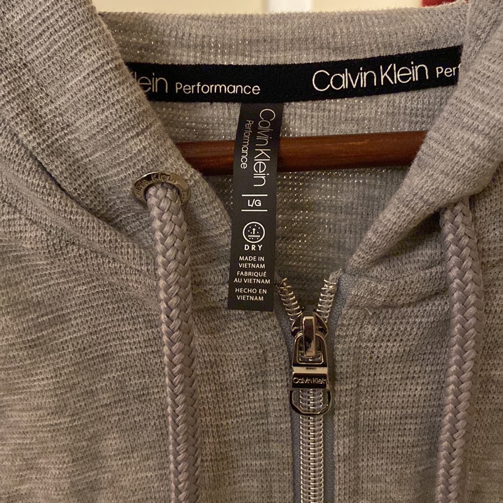 A Gray Calvin Klein hoodie